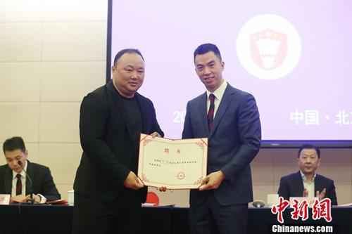 资料图:1月28日,中国羽毛球协会在北京举行第六届全国代表大会,两届奥运会混双冠军、现中国羽毛球队双打组主教练张军当选新一届中国羽协主席。中新社记者 韩海丹 摄 中国羽协发布2019年国内羽坛十大新闻